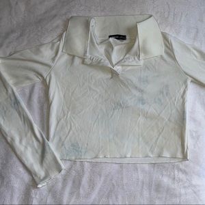 White crop stained (with laundry detergent)
